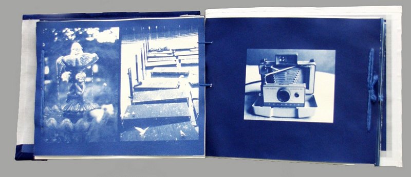 <b>Gabriela Alonso</b><br/><i>Cyanotype Book</i><br/>9&quot;x11&quot; Handmade Cyanotype Book with Emulsion Lifts. Arista II OHP Inkjet Transparency Film, Epson NX110 Inkjet Printer, Printfile Proofer, Blue Sunprint Cyanotype 8x10 Watercolor Paper and Fabric Squares, Lineco Linen Tape. Camera Images: Canon EOS Rebel XTI, 24-70 sigma 2.8 lens, Lexar Compact Flash. All film scanned with Epson V500 Scanner: Lomo Pop 9 Camera with Provia 400X Film. Fuji Mini 7s Camera with Fuji Mini Instax Film. Horizon Kompakt Camera with Arista Premium 400 Film. Canon EOS A2E Camera with Fuji Sensia 400 Slide Film and Ilford HP5 400 Film. Polaroid Land Camera with Fuji FP 100B Instant 2.25x3.25 Film. Black Bird Fly Camera with Arista Premium 400 Film. Black Slim Devil Camera with Fuji Provia 400X and Fuji Velvia 50 Slide Films. Golden Half Camera with Provia 400X Film.